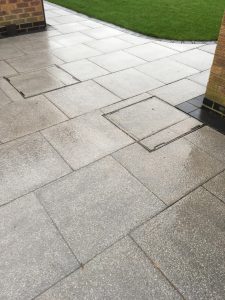 Patio Area With Matching Man Hole Covers