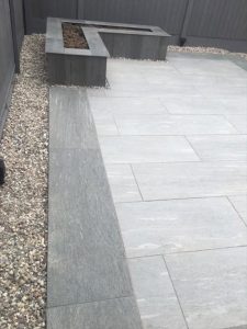 Raised Beds With Patio Area And Pebble Borders